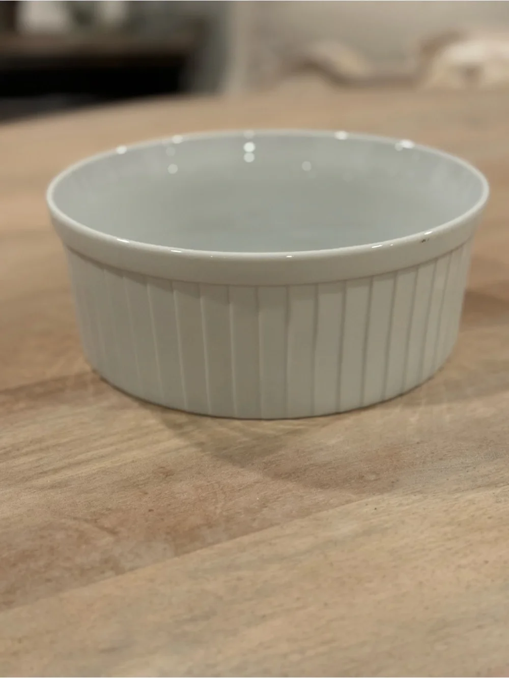 White Ceramic Plate with Small Decorative Sticker
